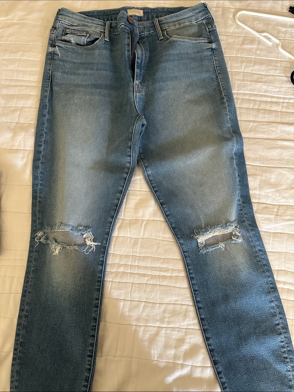 MOTHER Women’s Skinny Jeans in Medium Blue with Knee Rips